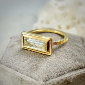 Yellow gold baguette diamond ring