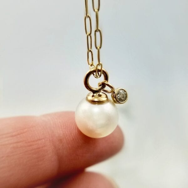 Pearl diamond pendant necklace