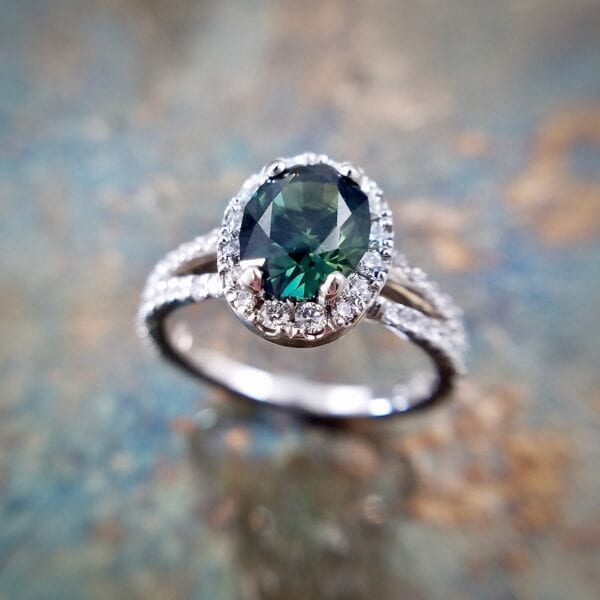 Oval sapphire diamond halo ring