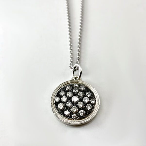 Silver diamond disc pendant necklace