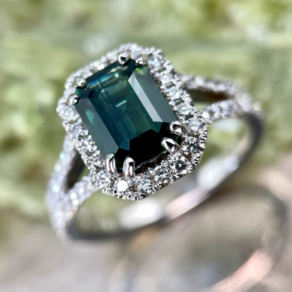 Emerald cut sapphire halo ring