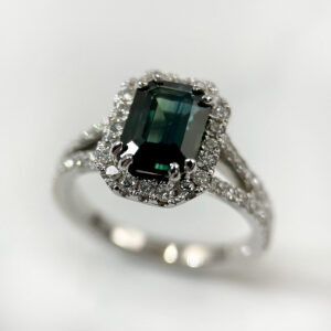 Emerald cut sapphire halo ring
