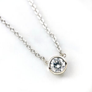 diamond bezel pendant in white gold