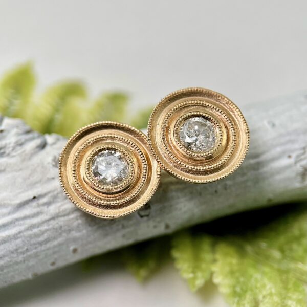 Gold halo diamond earrings
