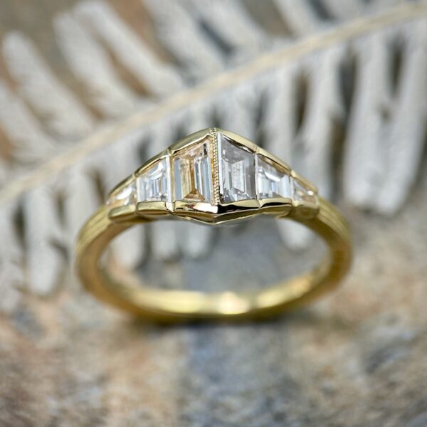 Tapered diamond baguette ring