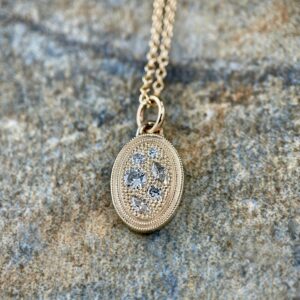 Oval Disc Pendant with Diamond Cluster