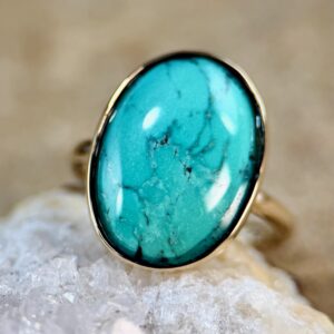 oval turquoise ring in gold